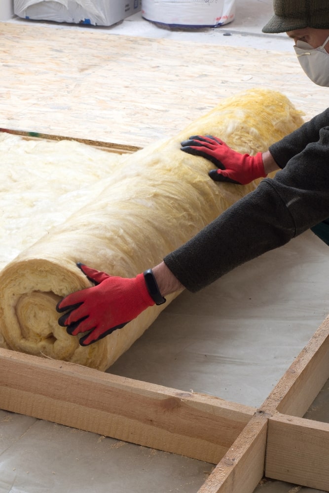 batt insulation being installed