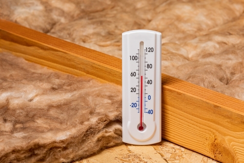 Thermostat measuring the temperature in an attic